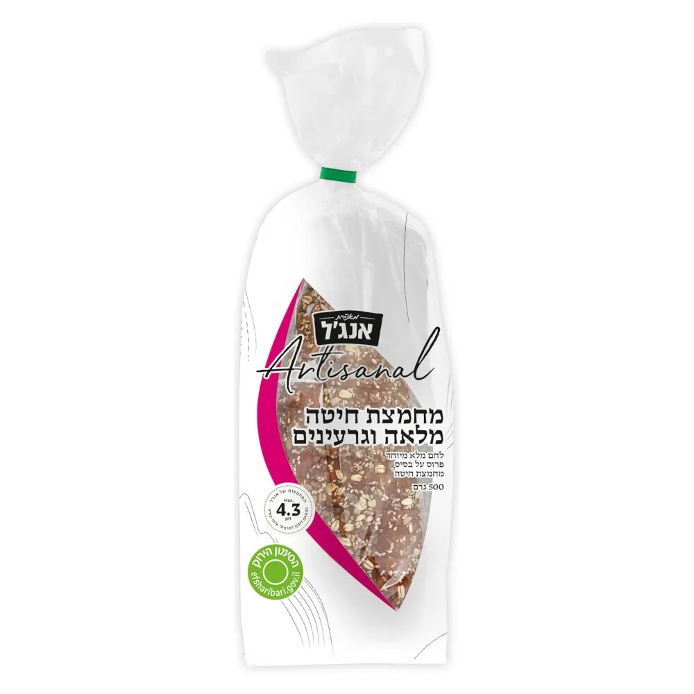 תמונה של לחם מחמצת חיטה מלאה וגרעינים